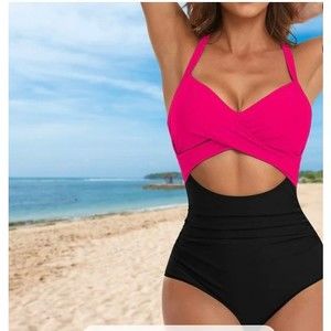 One piece XS Sexy Hot Pink and Black82% Polyester18% Spandex adjustable straps